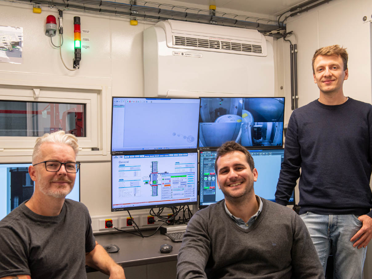 SCK CEN colleagues posing at SYSCADE control room