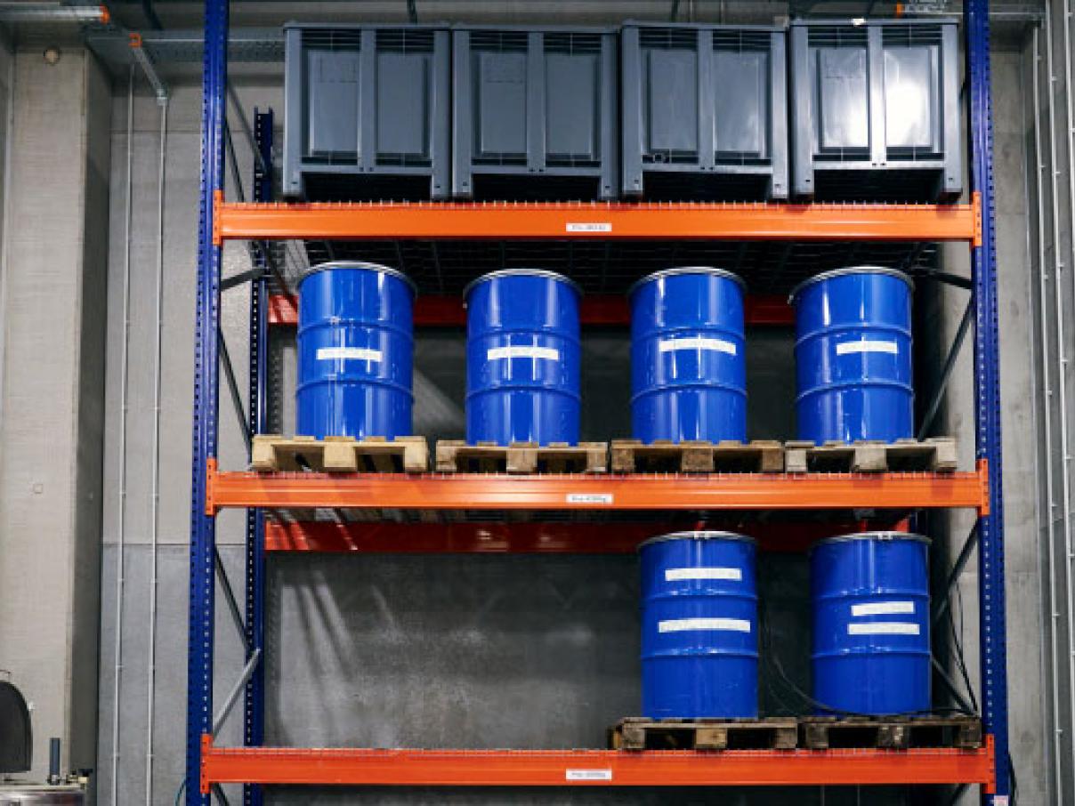 Rack with waste drums